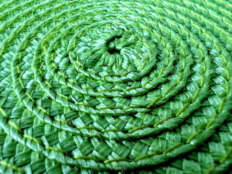 Green close up abstract futuristic spiral shape surface background