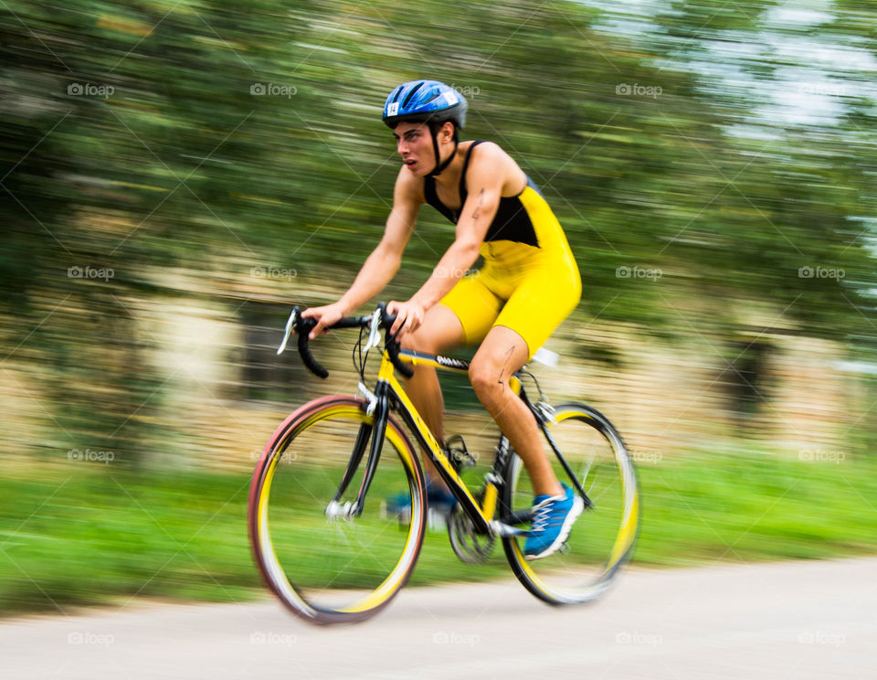 Racer on a bike. Contestant on a bike speeding