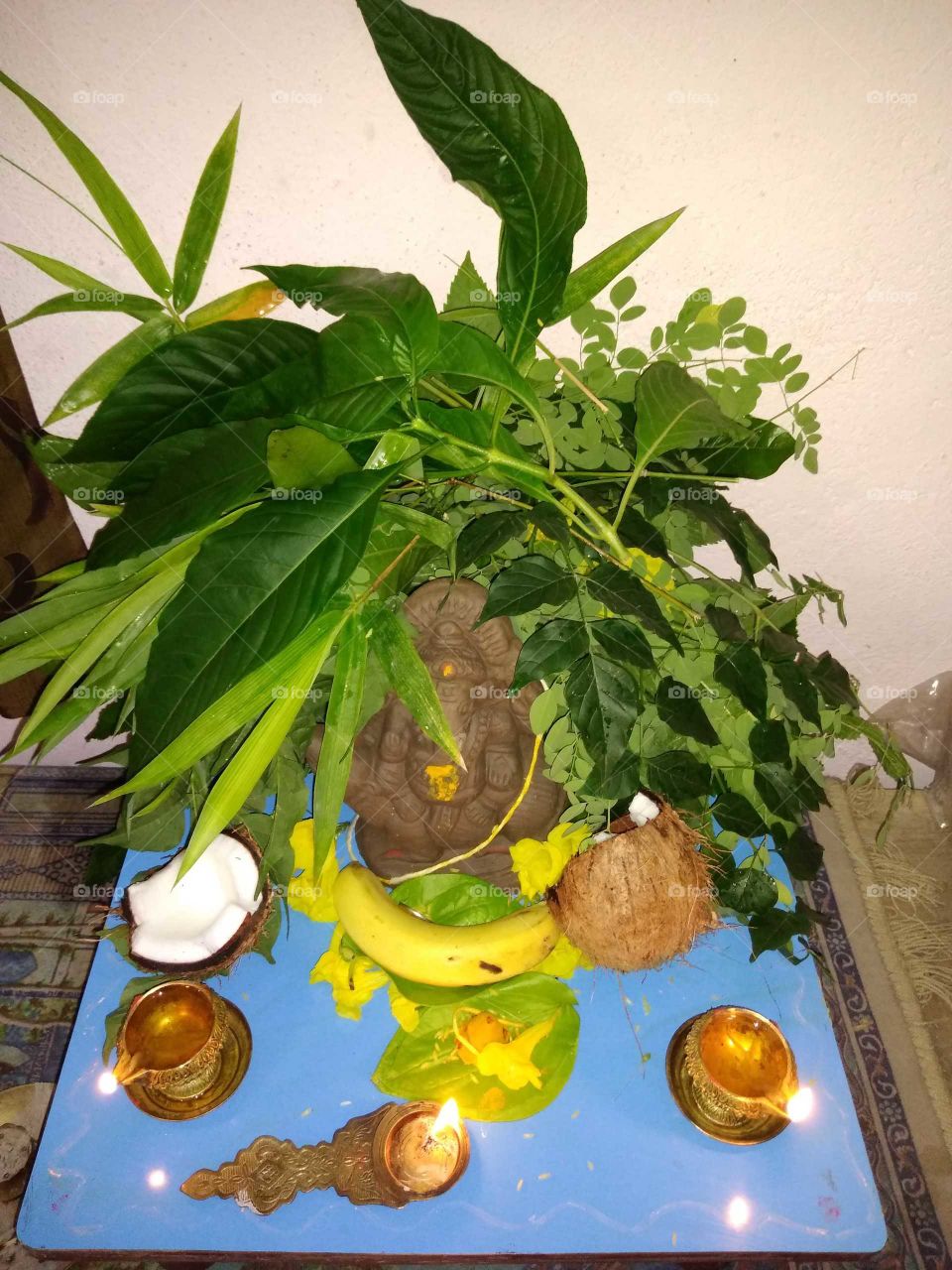 a Ganesh statue made out of mud