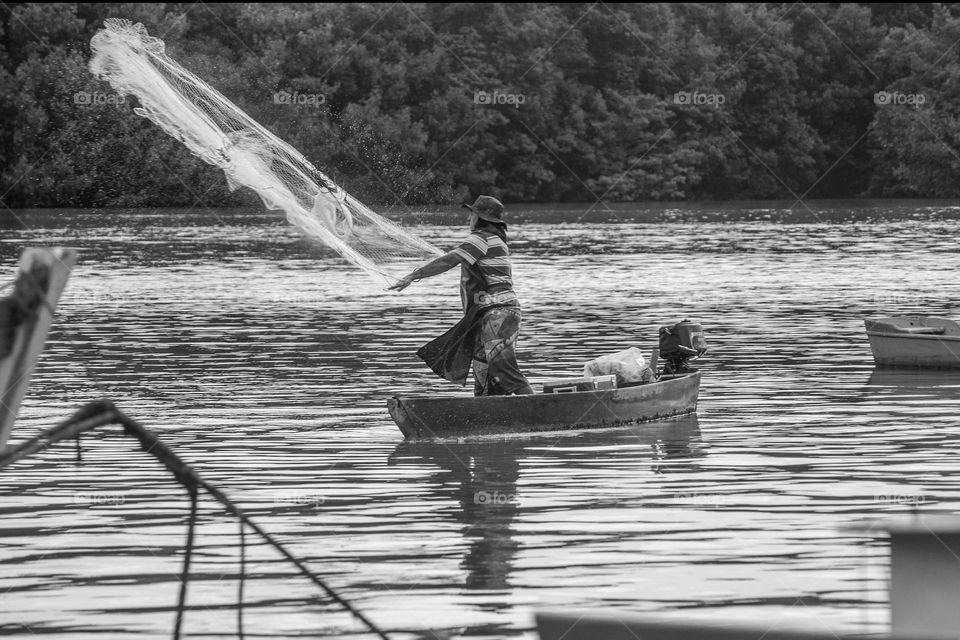 The fisherman.  Black and white photograph of a Brazilian fisherman's routine.