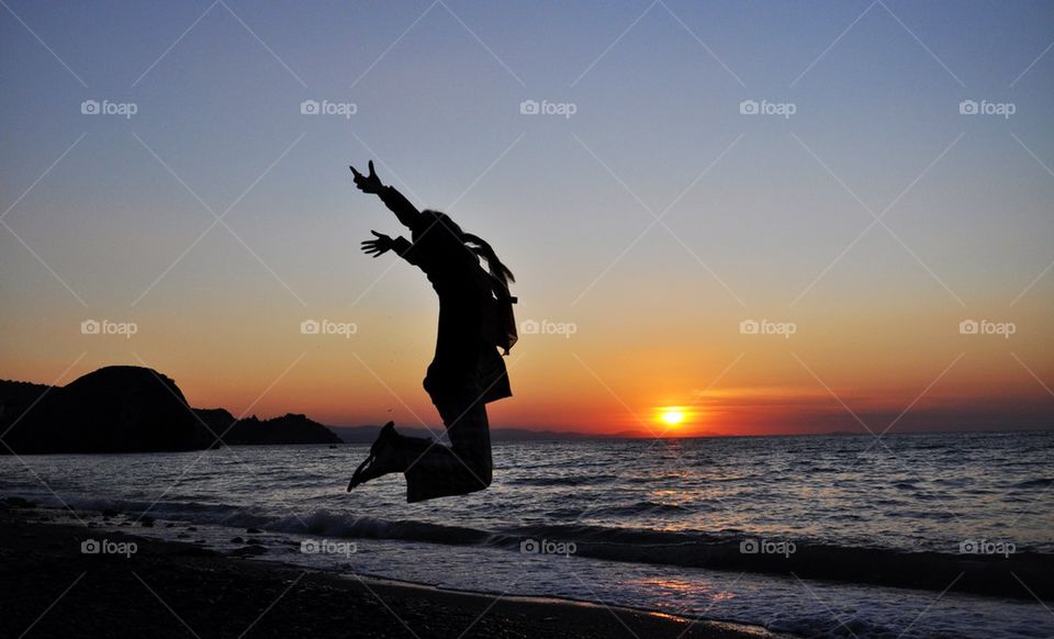 Jumping at seaside 