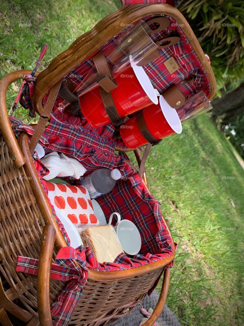 Picnic Basket Opened Up With Food And Items Needed For The Picnic Meal As A Family.