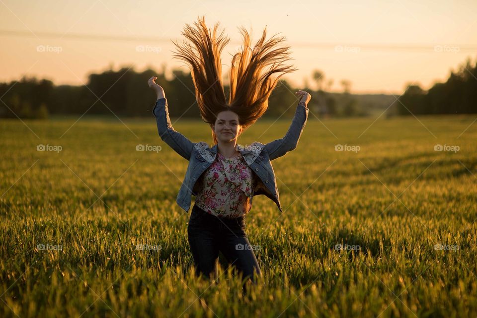 Beautiful girl with hair in the wind