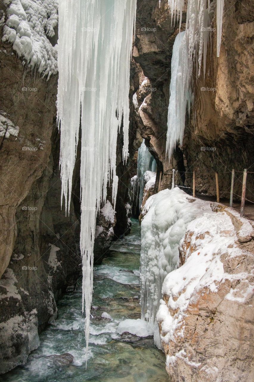 Stream water and icicles in gorge