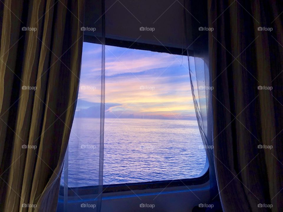 Sunrise through Ship Window