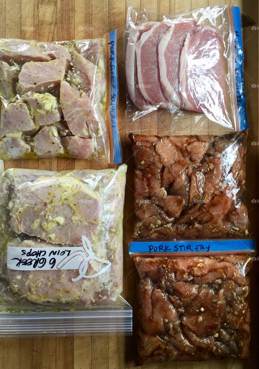 Portioning a full pork loin for individual family meals. Sliced, diced, flavored and bagged...ready for the freezer. Makes for easy meal prep for the busy family. 