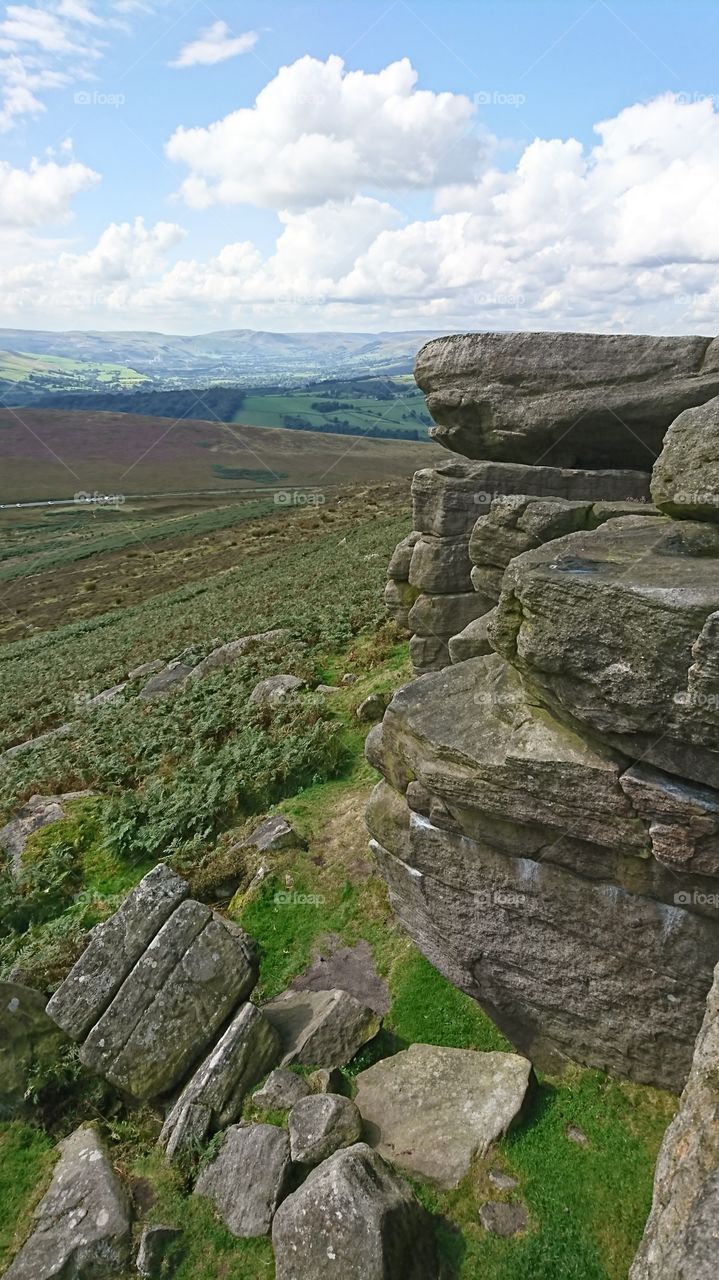 Standing on the edge of a cliff