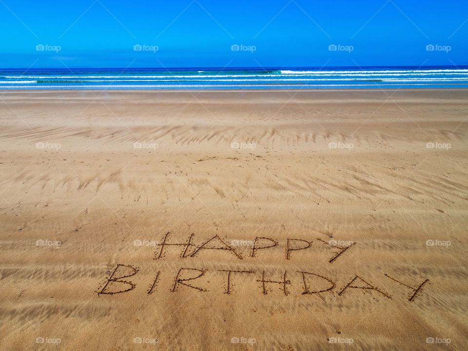 Happy birthday beach writing 