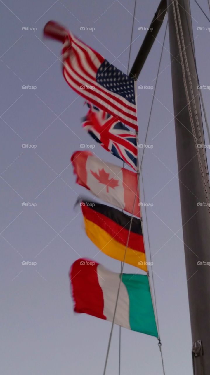 Sail boat Flags Whipping. Mast of flags