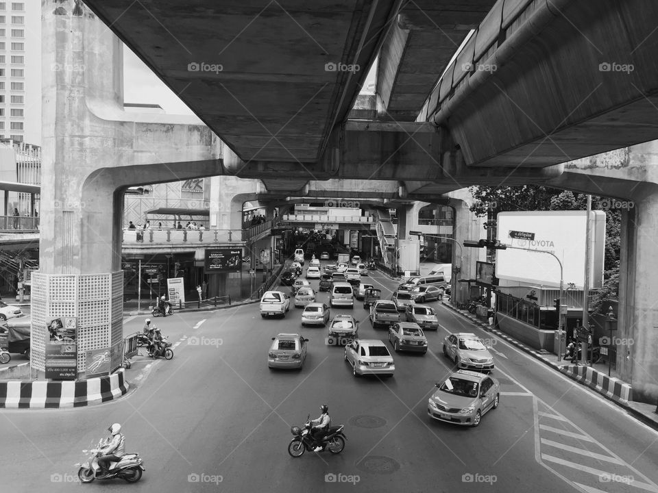 The busiest roads of Bangkok! . I took this picture when I was in Bangkok, Thailand. From the sky walk, you can see how busy it is. 