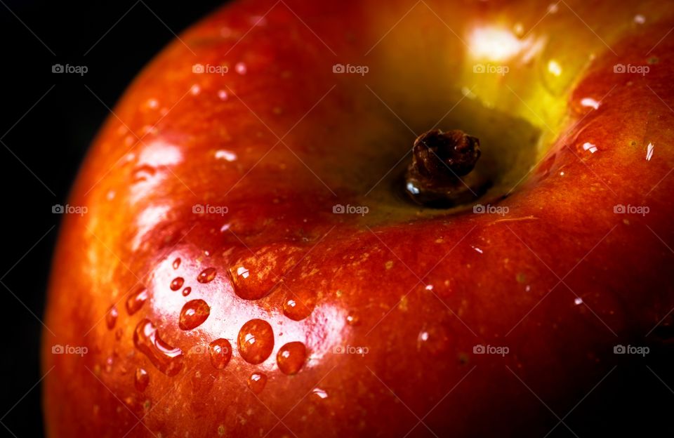 Extreme close-up of a wet apple