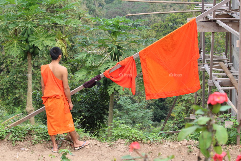 Back view monk at laundry - Luang Prabang-Laos - January 2016