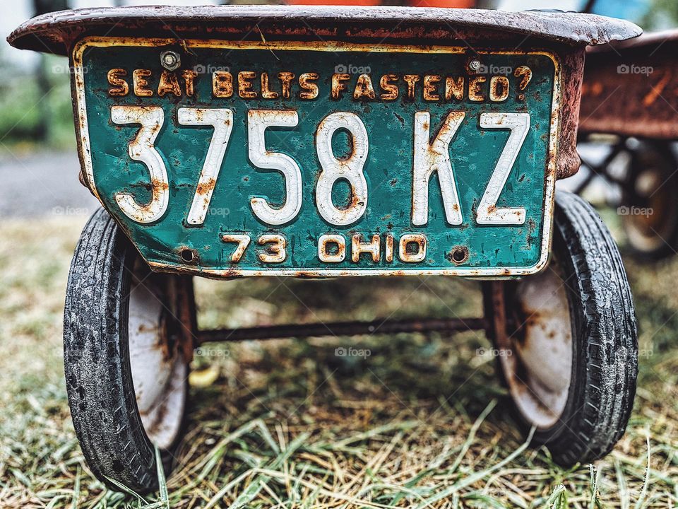 1973 Ohio license plate, license plates, wagons at a pumpkin patch on Ohio, unique ways to decorate wagons, seat belts fastened license plate, safety messages 