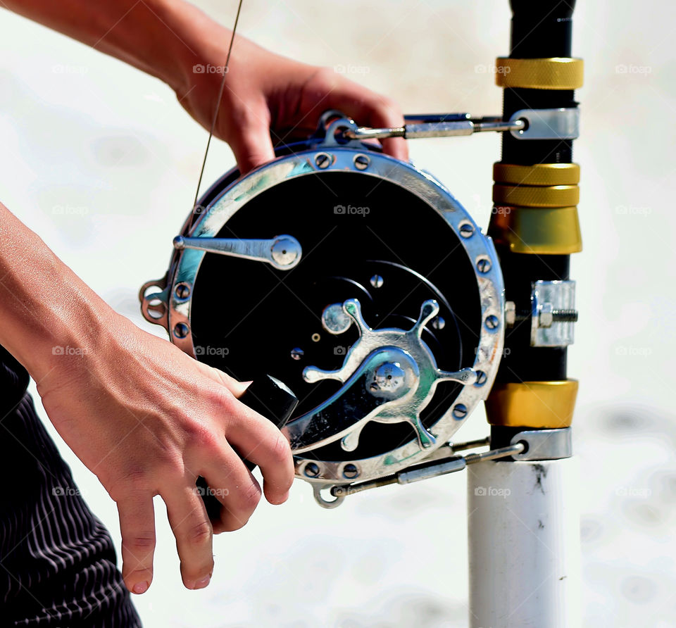 Close-up of a person fishing