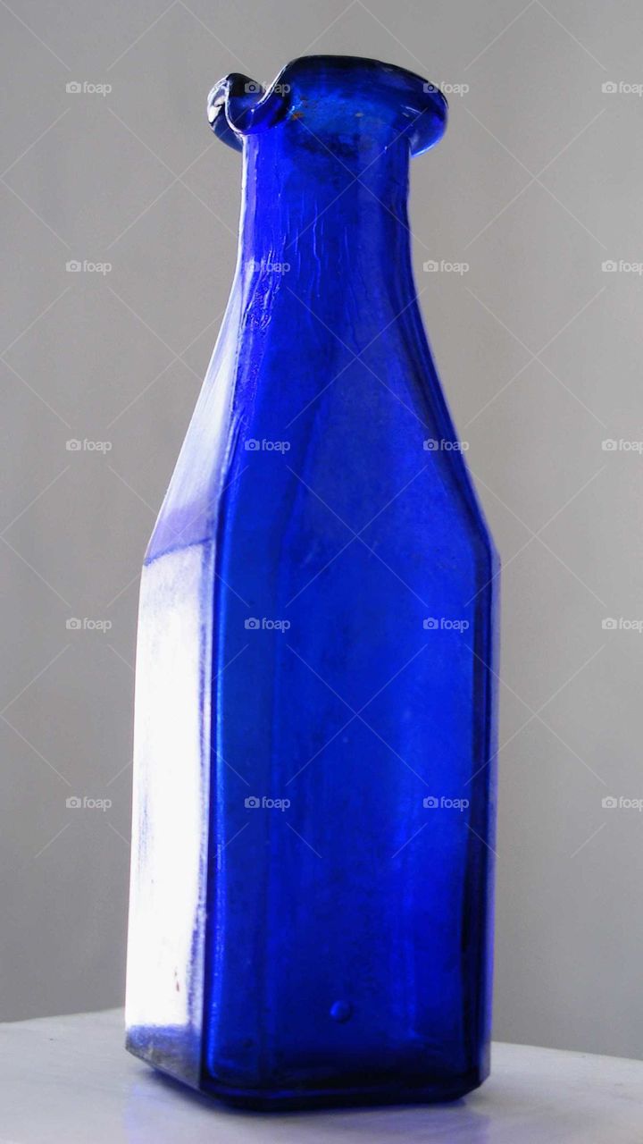 Small blue bottle