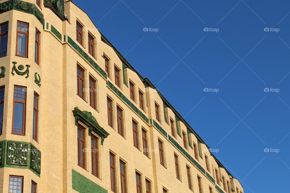 Hotel Moskva in Belgrade.  100-year-old building,  art nouveau style.  It is lined with yellow tiles and green ornamental