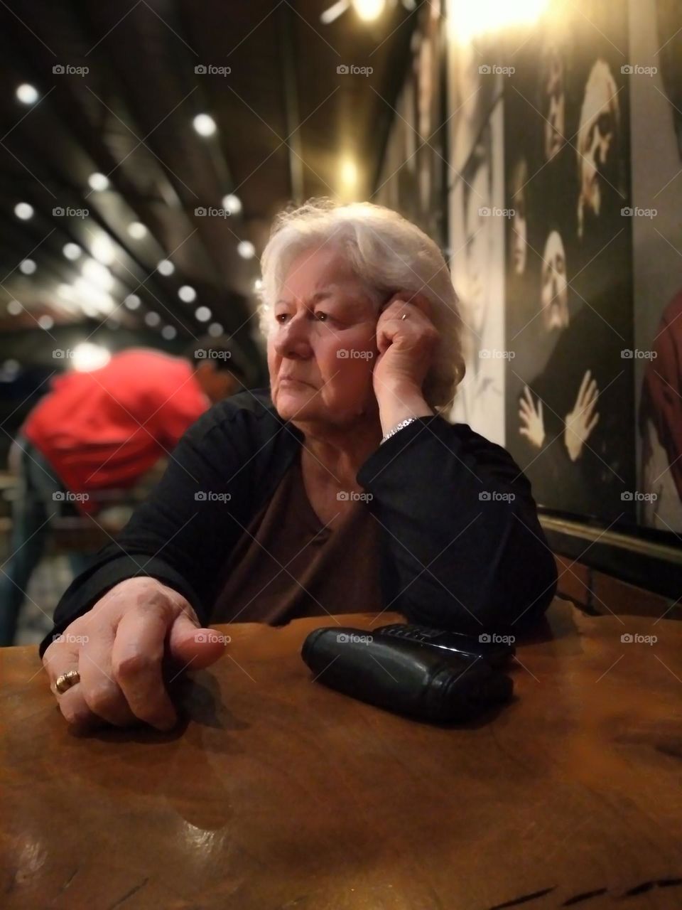 old woman in rockcafe