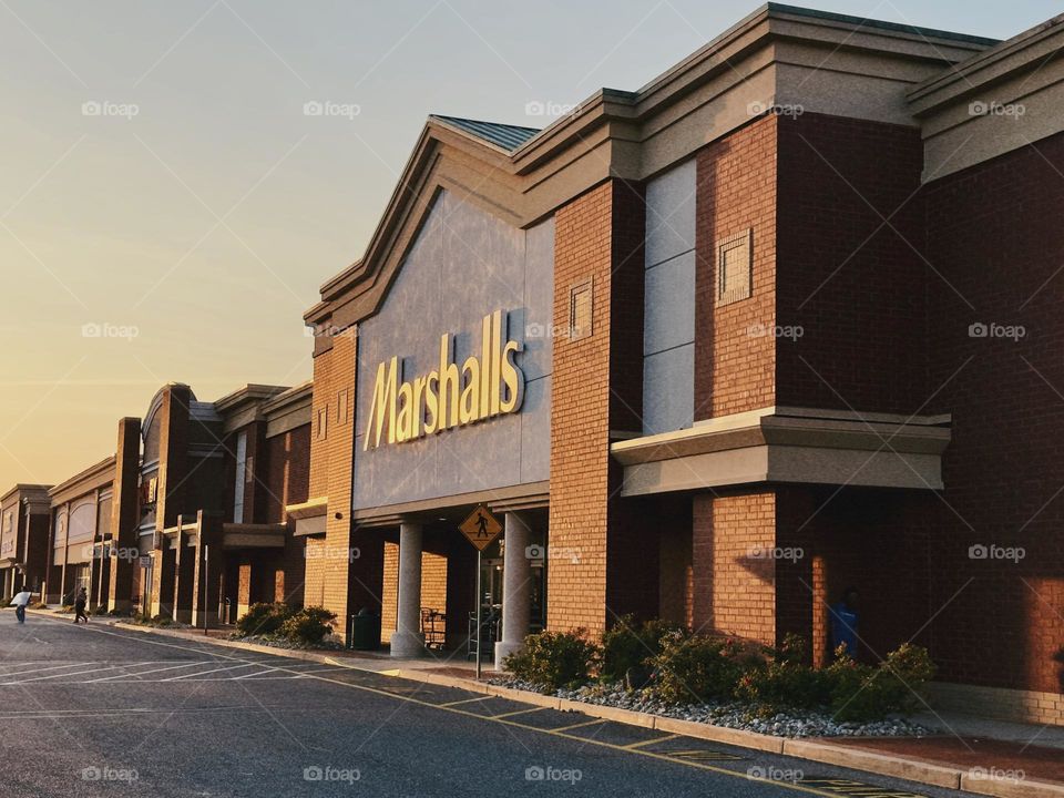 An off centered photograph of a Marshall’s at golden hour. 