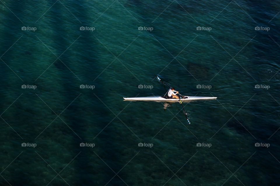 Rower and an open sea