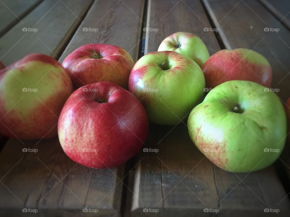 Apples on wooden table