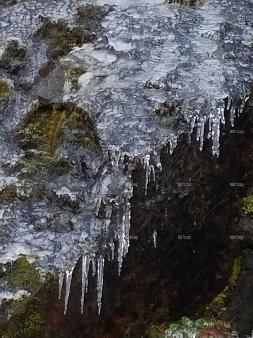 Ice cicles on the rocks
