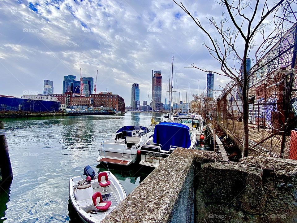 A beautiful view of Newtown Creek in Long Island City, Queens, NY photographed today on December 27th, 2021 from the parking lot underneath the Pulaski Bridge. Hypnotic Productions