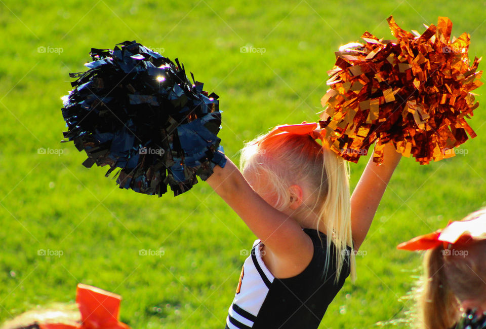 young cheerleader, black and orange