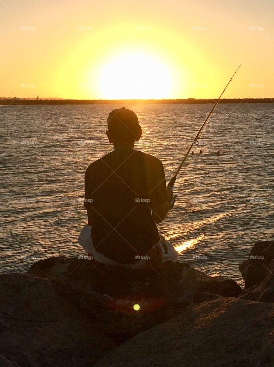 Pescando ao pôr do sol 