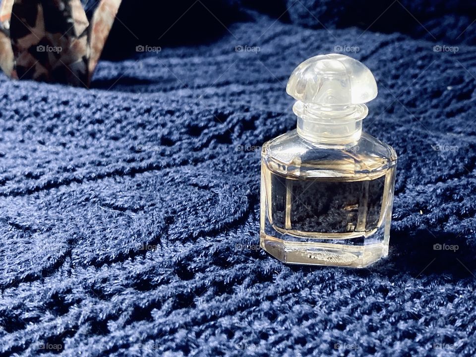 The bottle of perfume