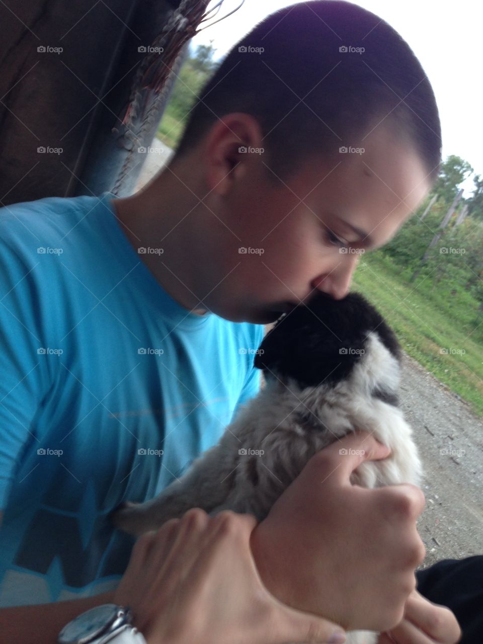 Boy with a puppy