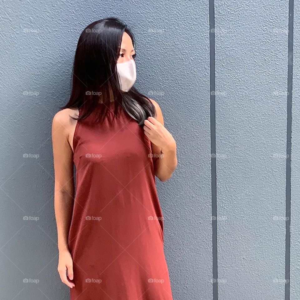 Asian woman in silver grey ash hair colour outdoor 