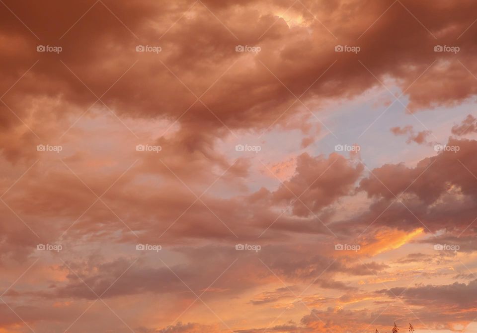 Sunset in Desert as Storm Clouds Roll In