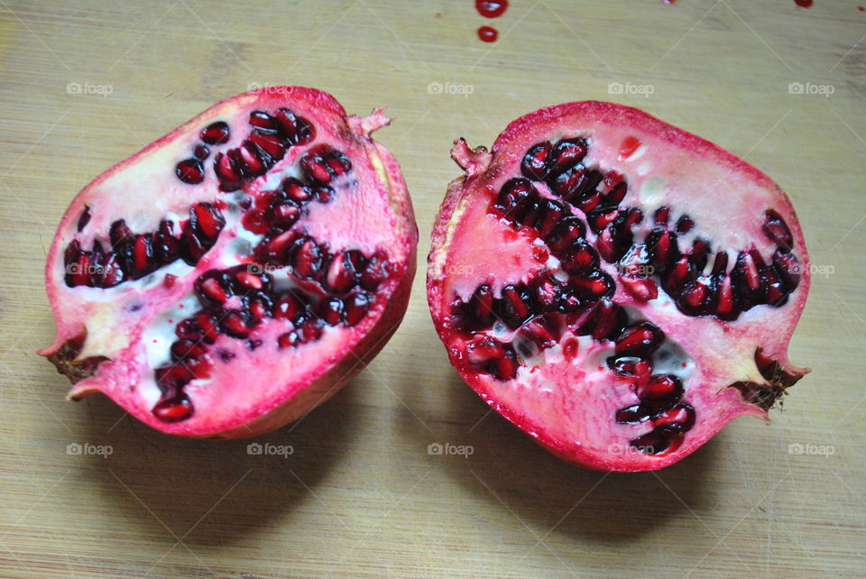 Two halves of a pomegranate