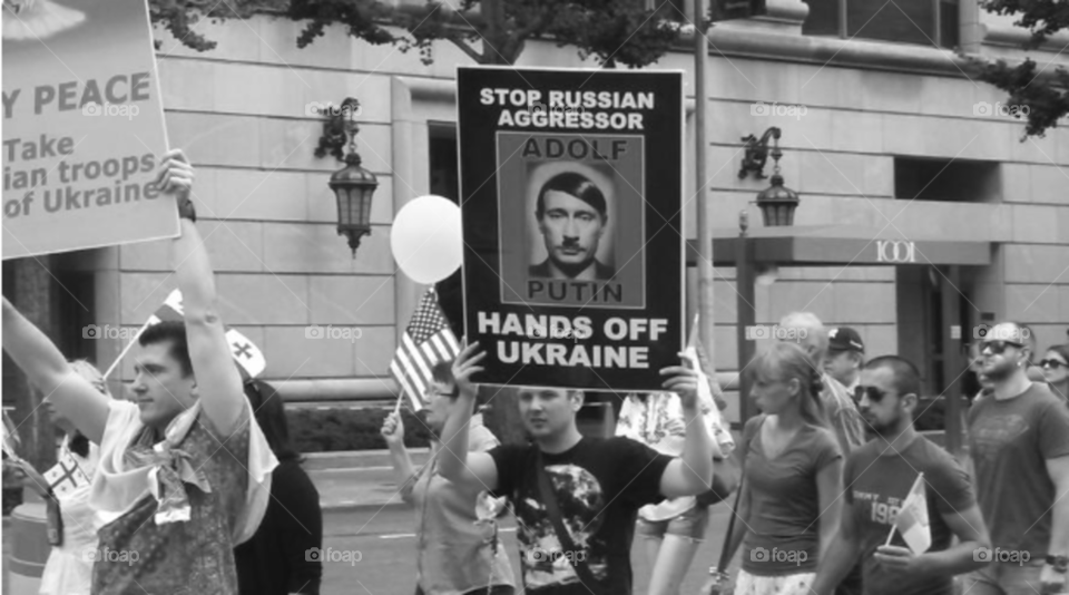 As I waited in front of the Metropolitan museum of Art, in NYC,  a peaceful march/protest passed by against the occupation of Ukraine. protest, march, fight, peaceful,