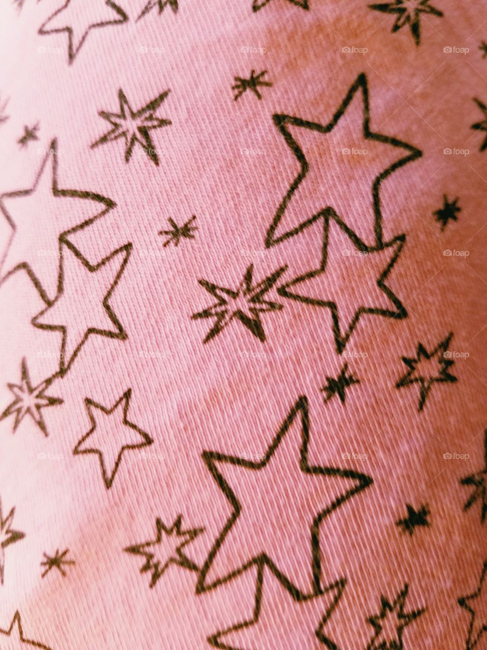 stars on the fabric of a pair of pants