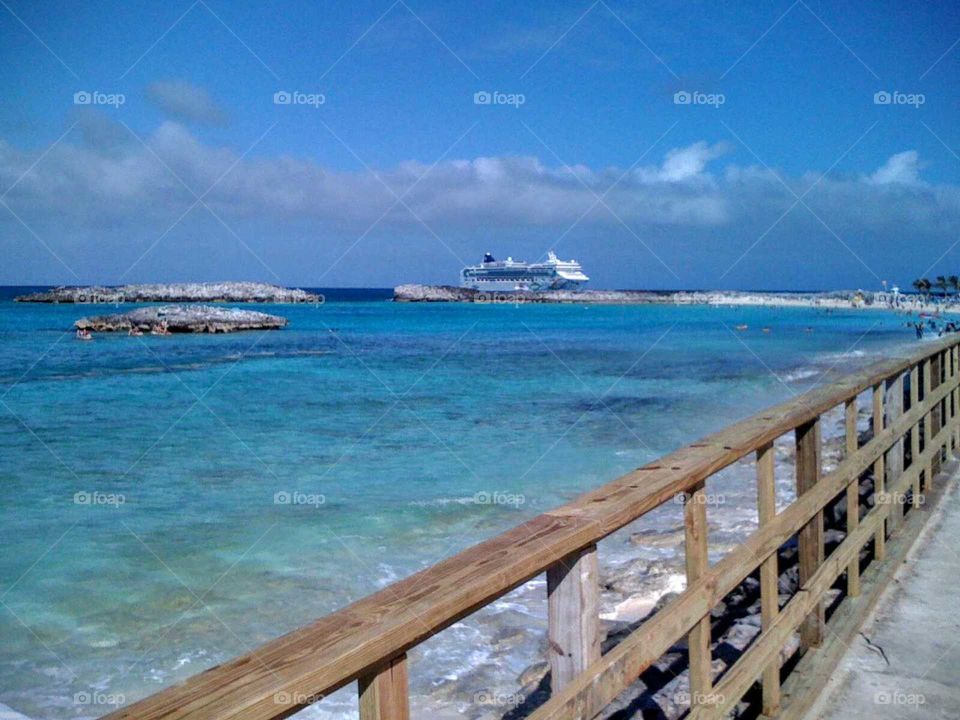 As the sky is blue the ocean is too