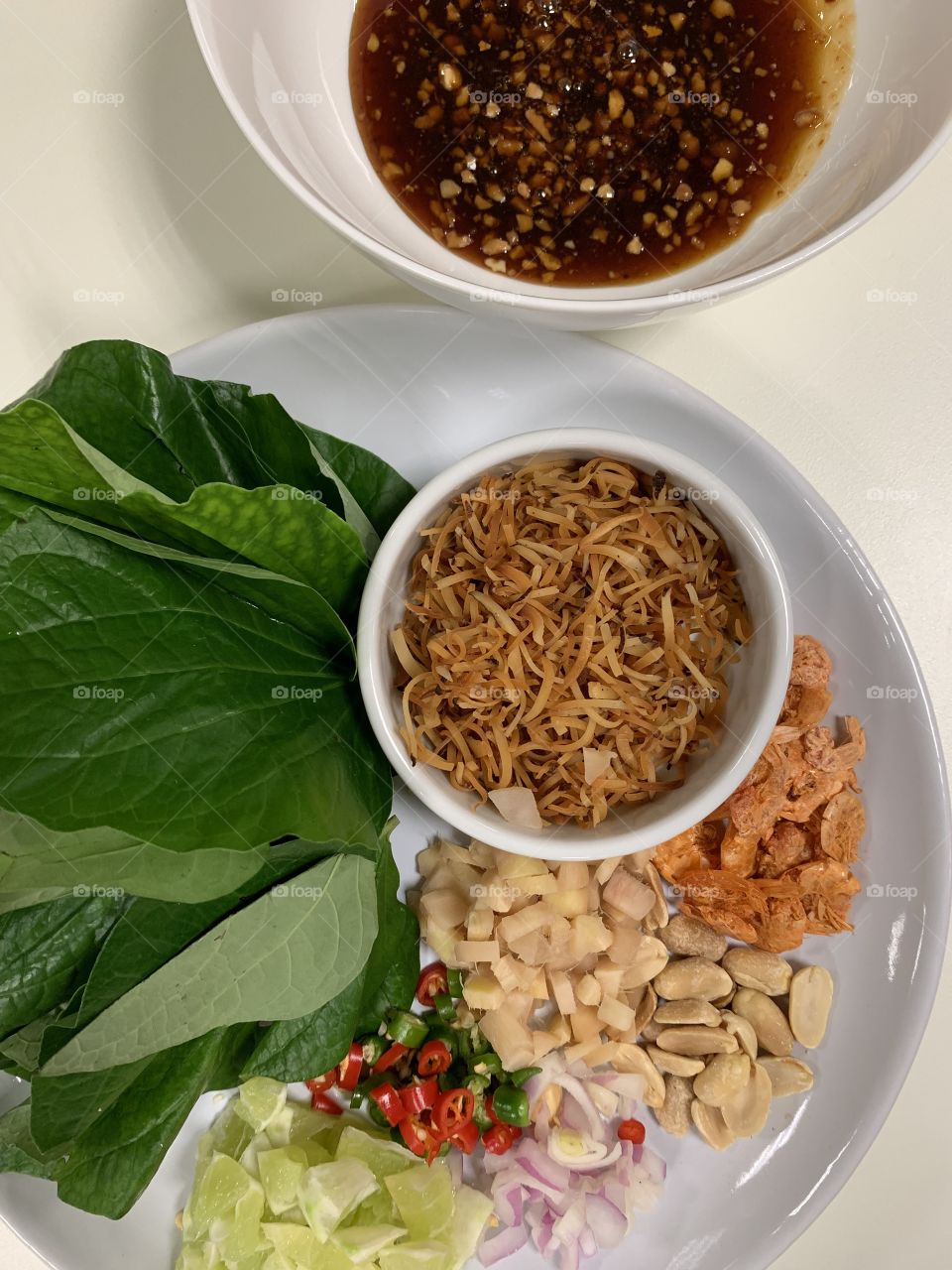 Thai food like fresh leaves spring roll bite by bite