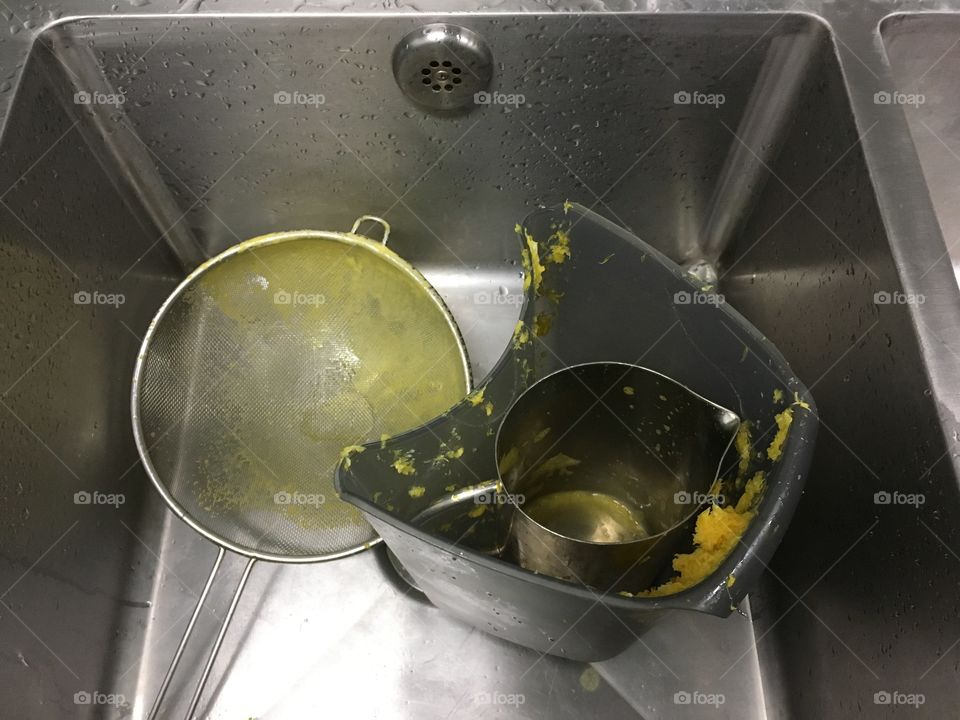 Dirty kitchen  equipment in sink 