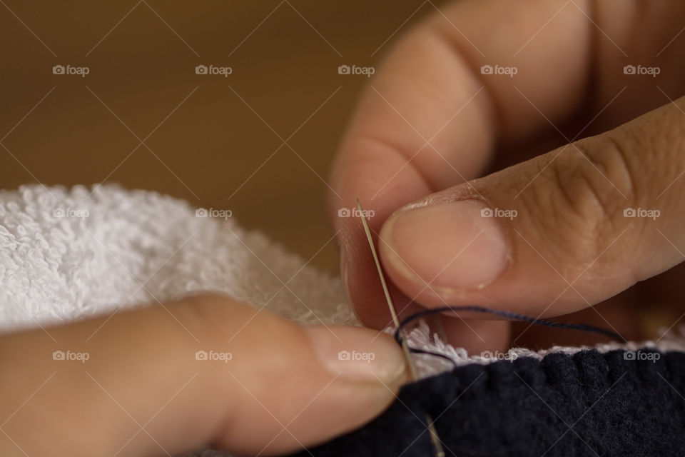 Sewing with needle and thread