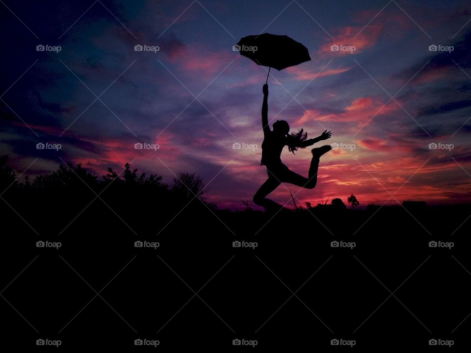 Girl with umbrella silhouette