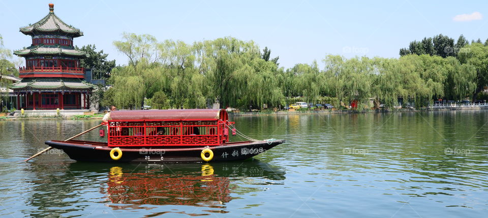 Asia China Beijing Hohai park lake boad on the lake traditional china spring time