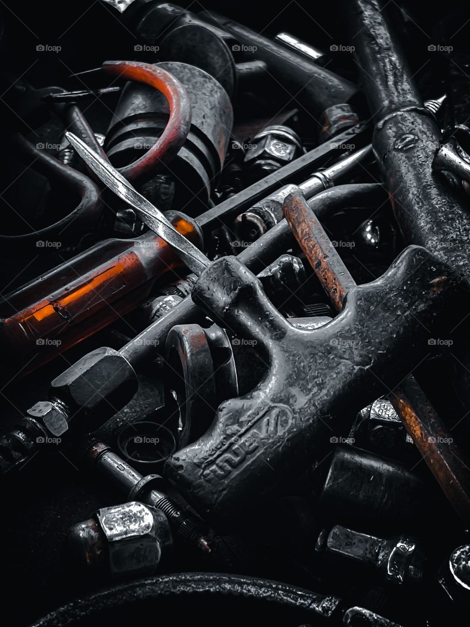 Dirty and old tools scattered in close up view. For fixing tyre.