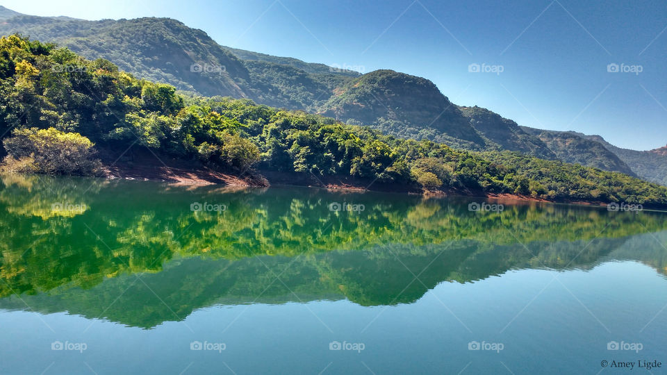 Mountain range reflecting on lake