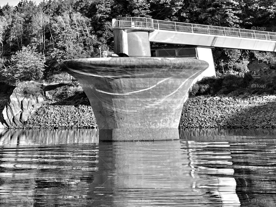 Building for flood control in black and white