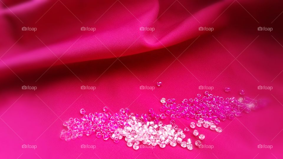 Pink material with glass beads