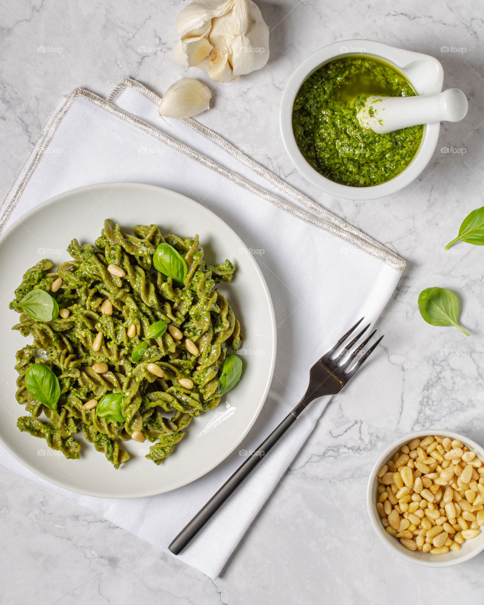 Green fussily with homemade basil pesto