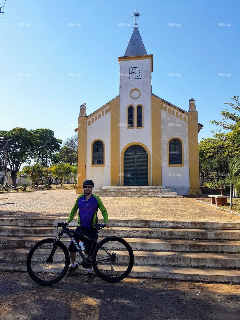 I meet a small church on a bicycle.