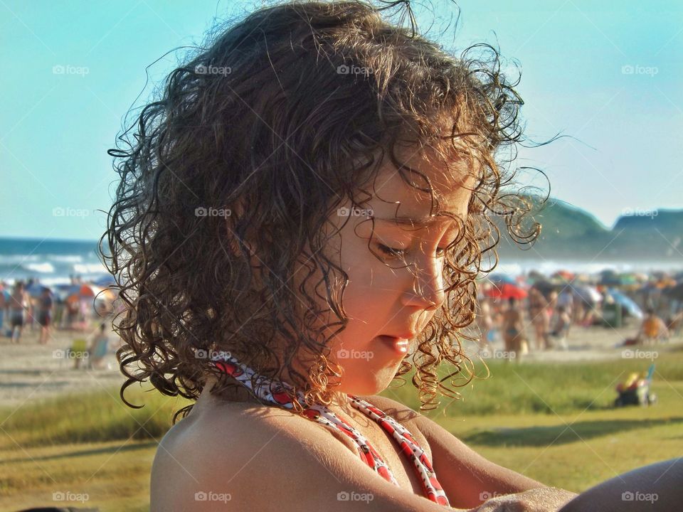 Summer sunshine on the girl's face