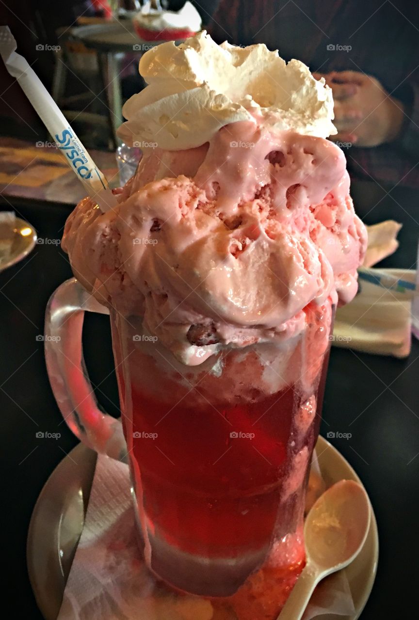 Strawberry craft soda ice cream float. 