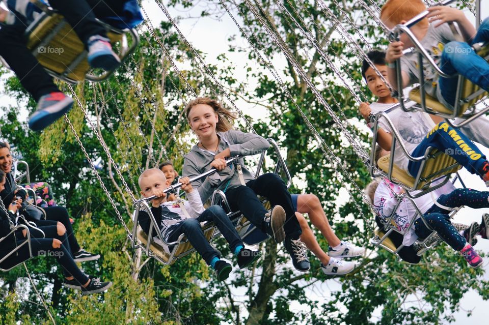 Happy kids in the swing 